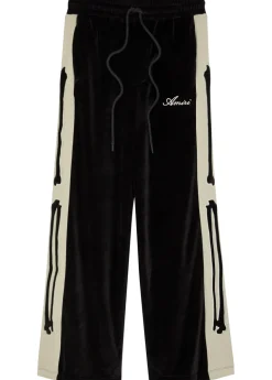 Amiri Bones appliquéd velour track pants