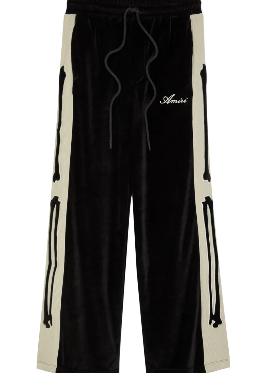 Amiri Bones appliquéd velour track pants