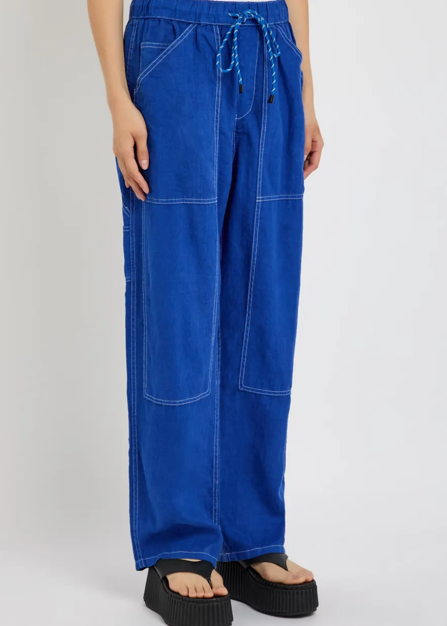 Atlas panelled relaxed straight-leg linen trousers