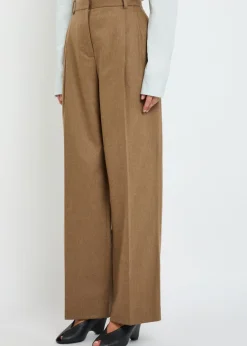 August pleated wool-blend trousers
