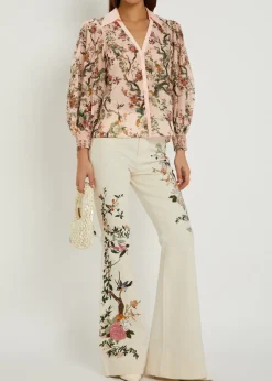 Beautiful floral-embroidered flared-leg jeans