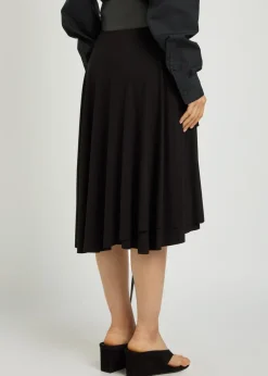 Belted asymmetric jersey mini skirt