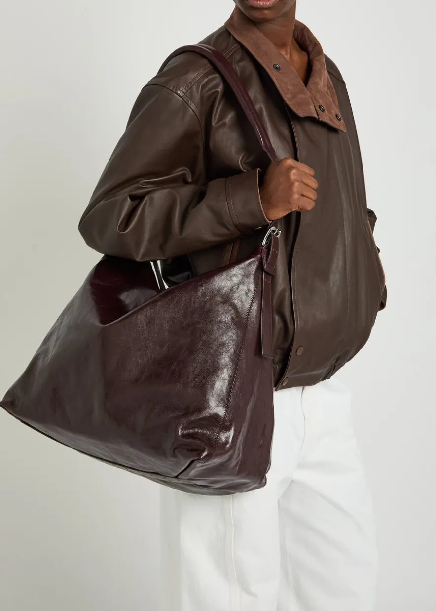 Belted leather hobo bag