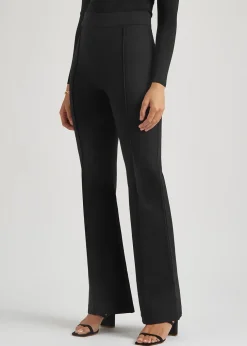 Black stretch-jersey flared-leg trousers