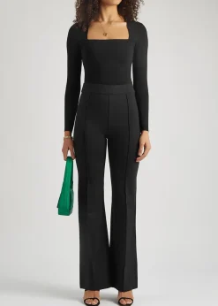 Black stretch-jersey flared-leg trousers