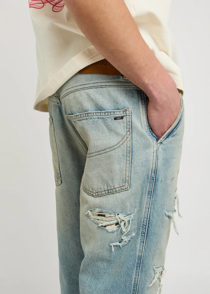 Checkered Repair distressed bootcut jeans