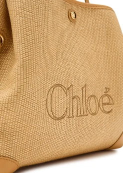 Clover logo-embroidered raffia tote bag