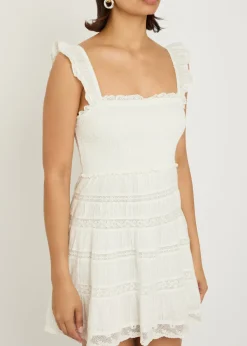 Colbera lace-trim cotton mini dress