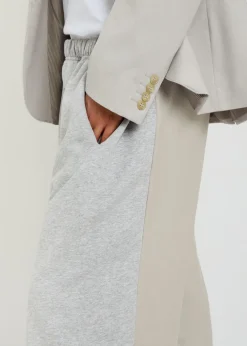 Contrasting cotton and wool-blend trousers