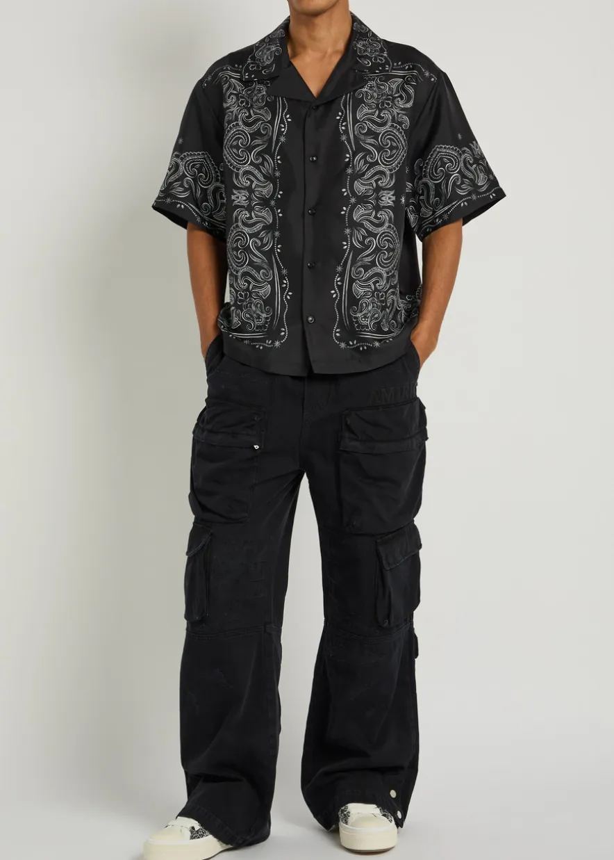 Distressed denim cargo trousers