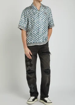 Distressed logo-appliquéd straight-leg jeans