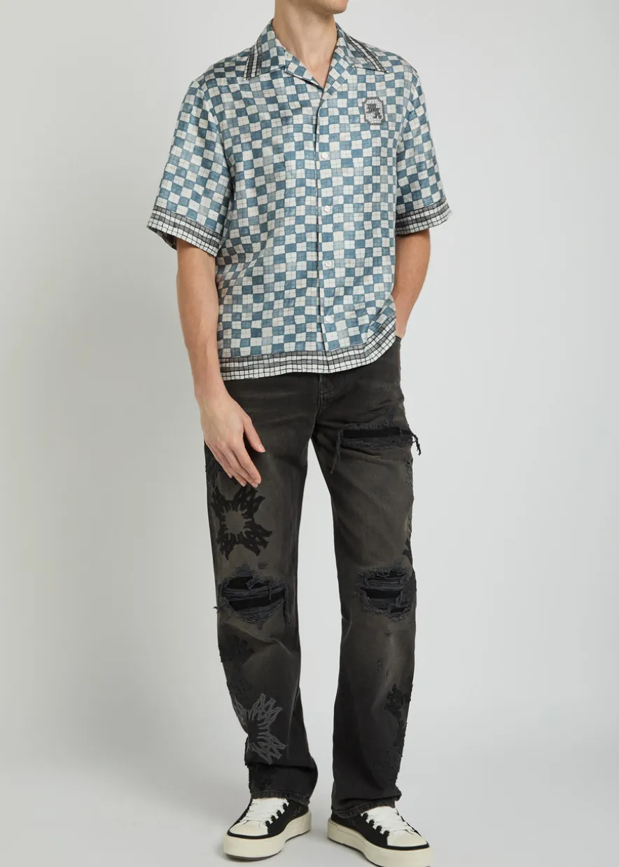 Distressed logo-appliquéd straight-leg jeans