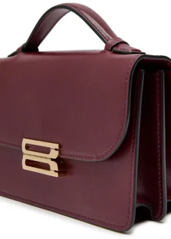 Dorian mini grained-leather top handle bag