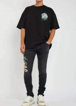 Dragon Repair embroidered slim-leg jeans