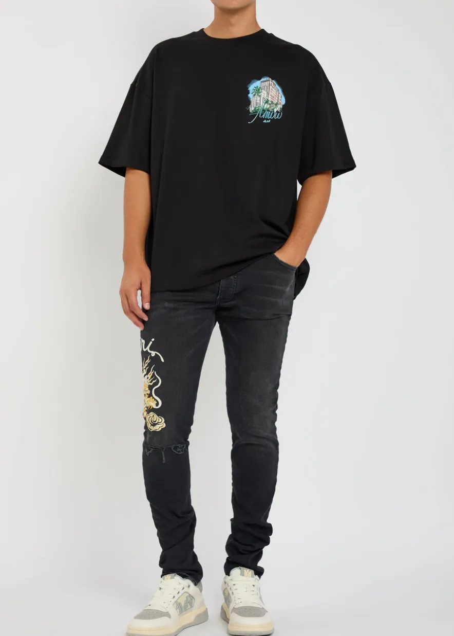 Dragon Repair embroidered slim-leg jeans