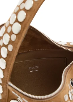 Elena small stud-embellished suede top handle bag