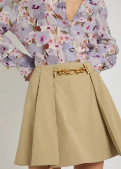 Embellished pleated cotton mini skirt