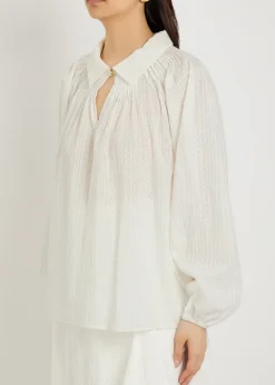 Embroidered gathered cotton shirt