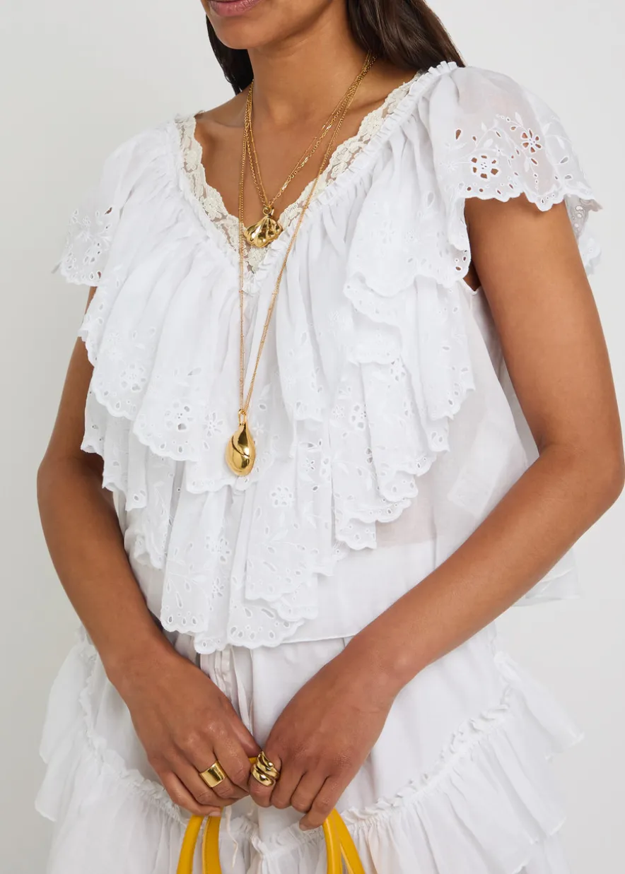 Embroidered ruffled cropped cotton top