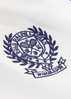 Embroidered stretch-cotton polo top