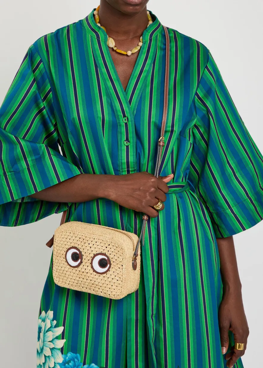 Eyes appliquéd raffia cross-body bag