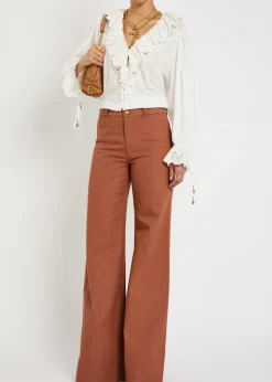 Flared-leg canvas trousers