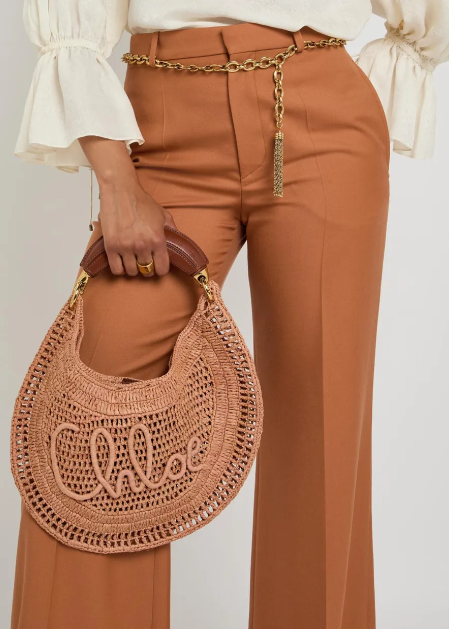 Flared-leg wool trousers