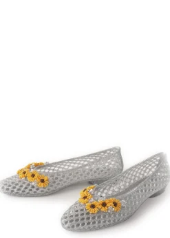 Flower-embellished jelly ballet flats