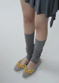Flower-embellished jelly ballet flats