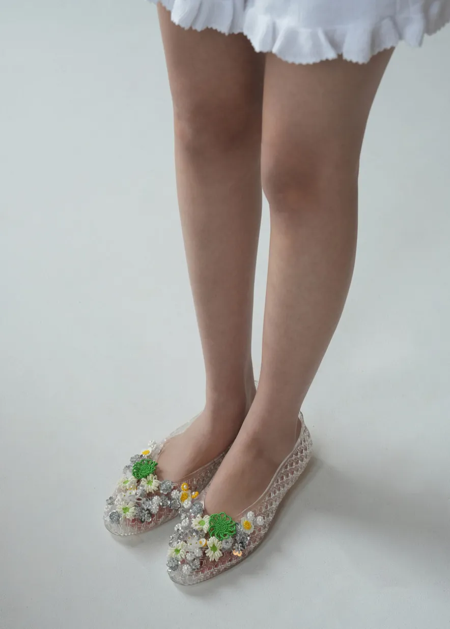 Flower-embellished jelly ballet flats