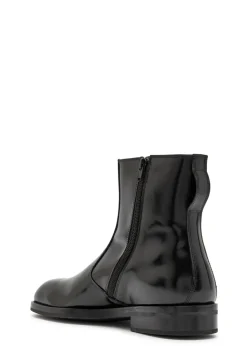 Glossed leather ankle boots