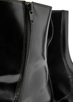 Glossed leather ankle boots