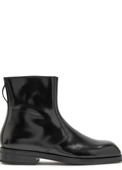 Glossed leather ankle boots