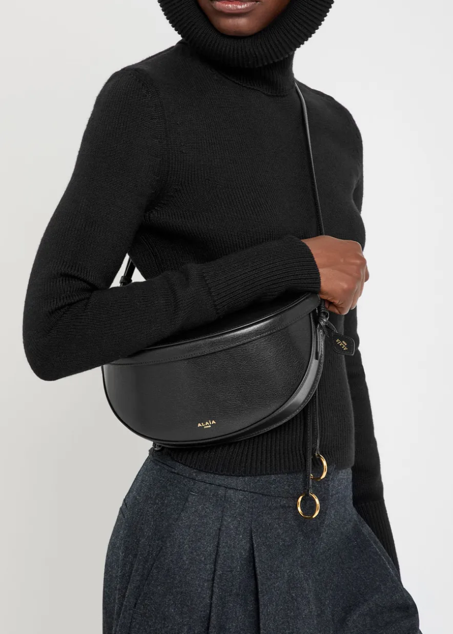Hip East West grained leather cross-body bag