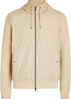 Hooded padded stretch shell and cotton-knit jacket