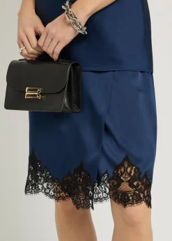 Iconic lace-trimmed satin knee-length wrap skirt