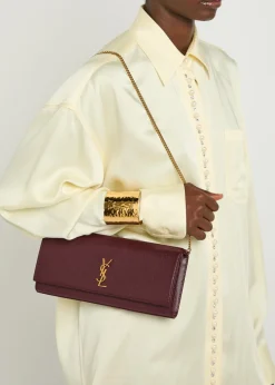 Kate logo pebbled leather clutch