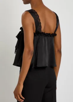 Lace-embellished ruffled silk blouse