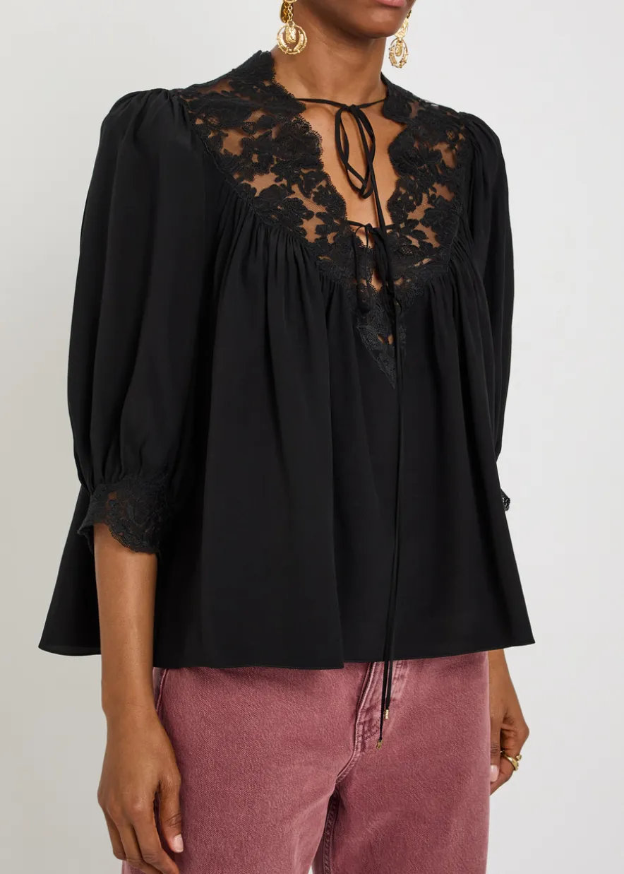 Lace-trimmed silk blouse