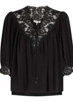 Lace-trimmed silk blouse