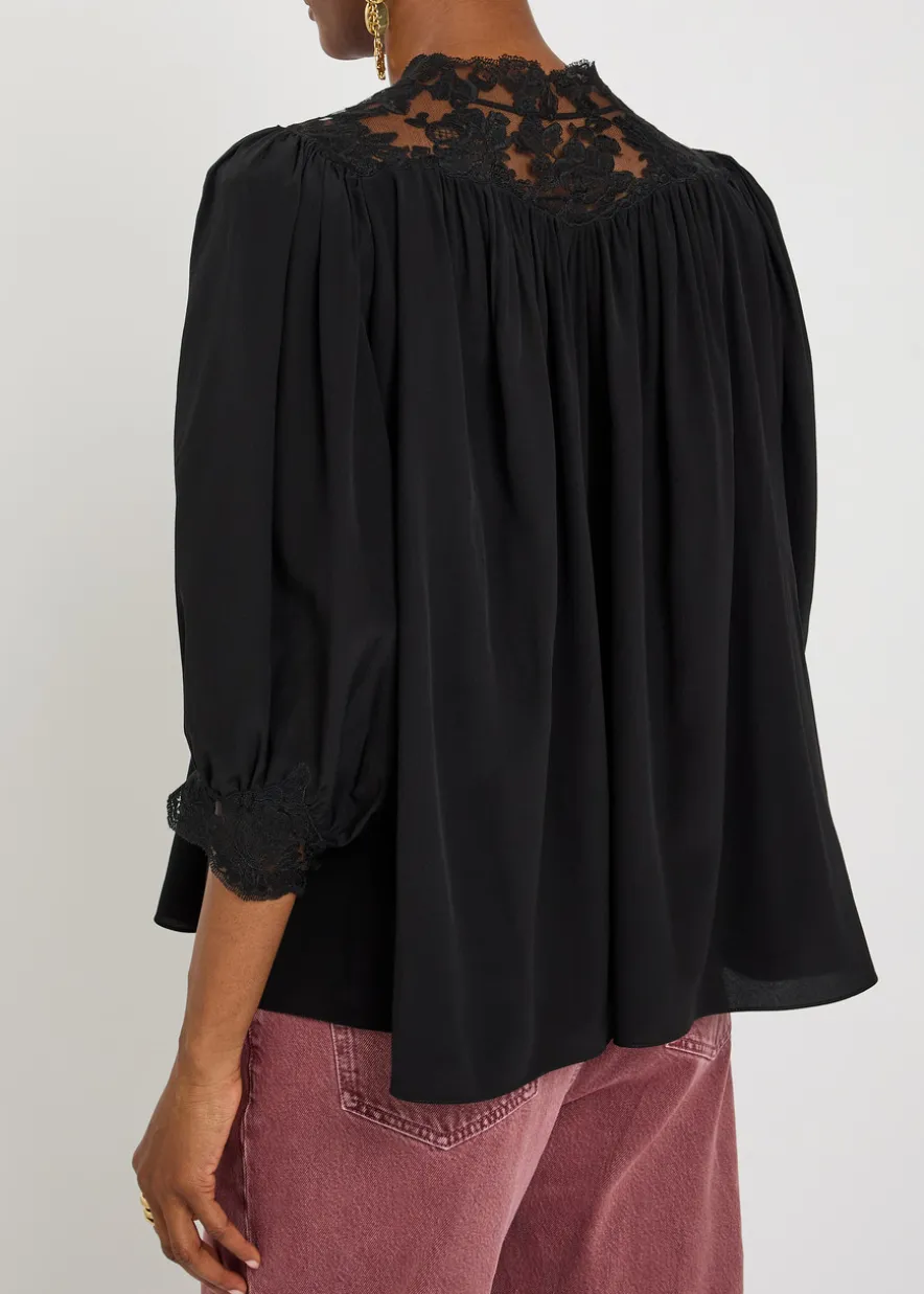 Lace-trimmed silk blouse