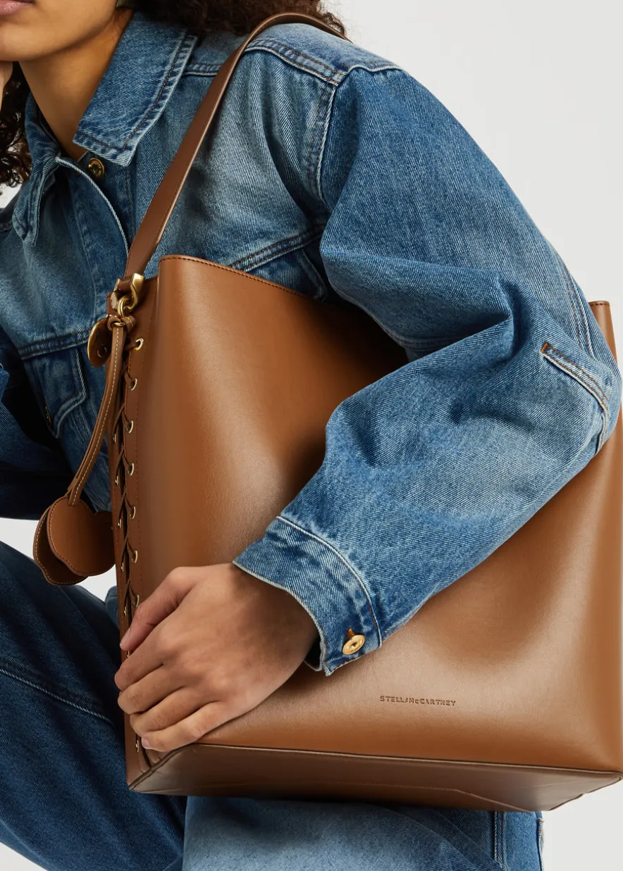 Lace-up faux leather tote