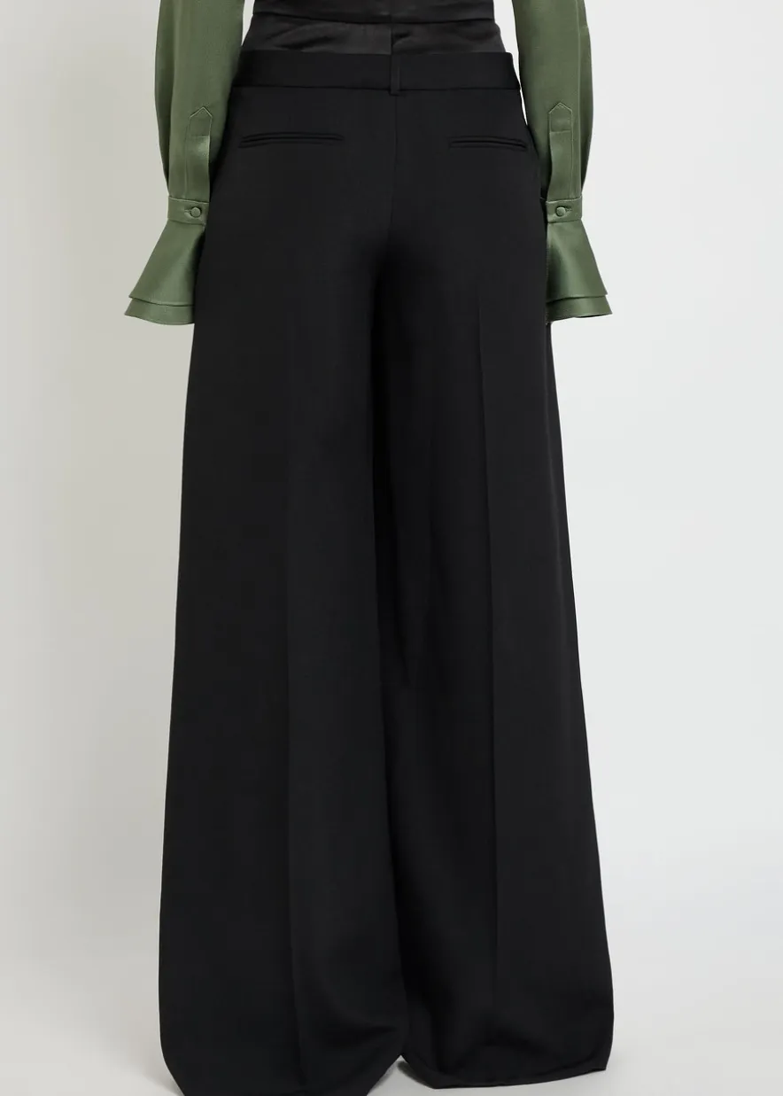 Layered wide-leg silk-blend and wool trousers