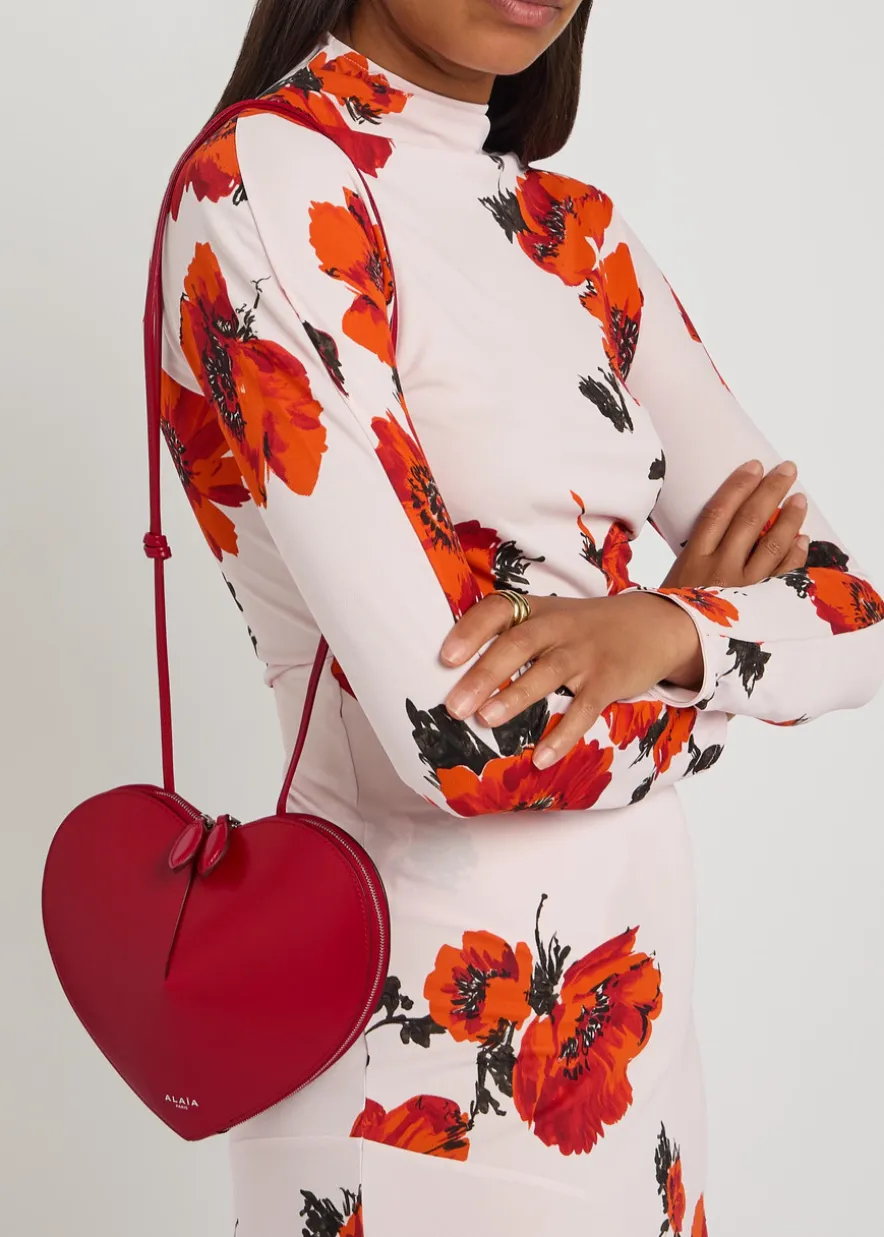 Le Couer glossed leather cross-body bag