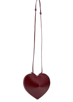 Le Couer glossed leather cross-body bag