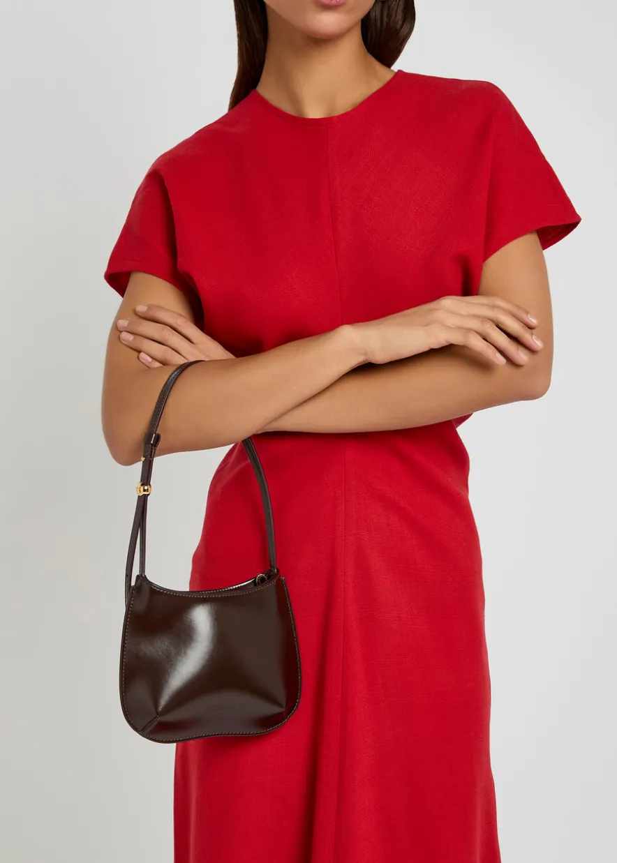 Le Petit Bisou glossed leather shoulder bag