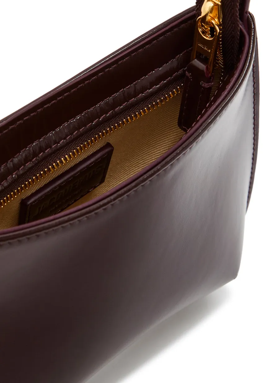 Le Petit Bisou glossed leather shoulder bag