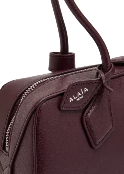 Le Teckel medium grained leather shoulder bag