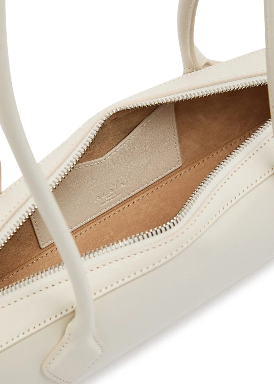 Le Teckel small grained leather shoulder bag