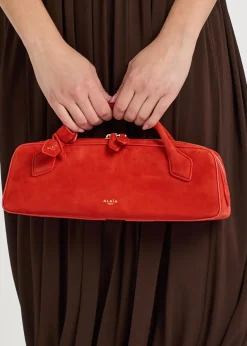 Le Teckel suede clutch